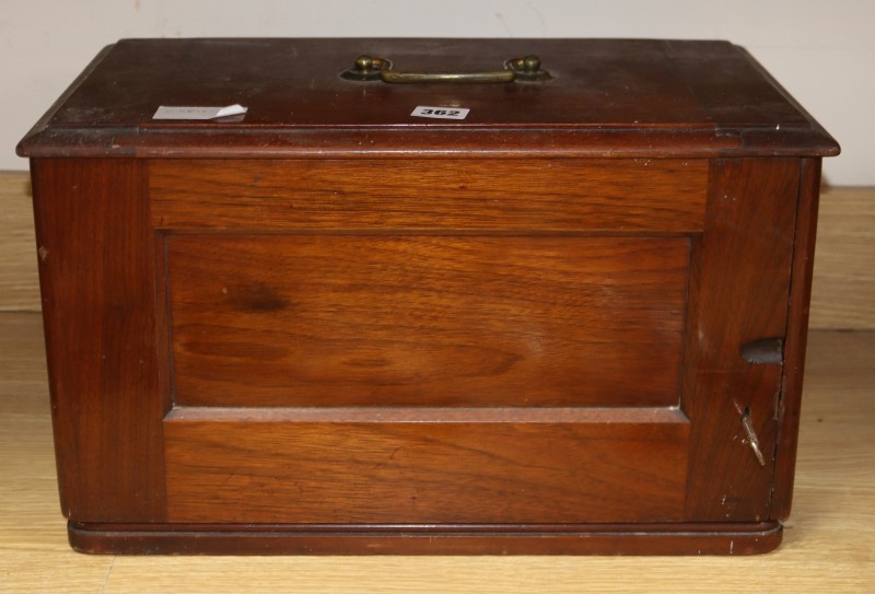 A Victorian walnut cased Singer sewing machine